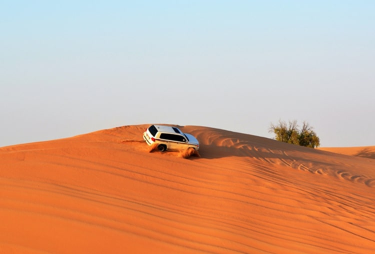 Toyota Landcruiser offroad sand dunes in Dubai desert